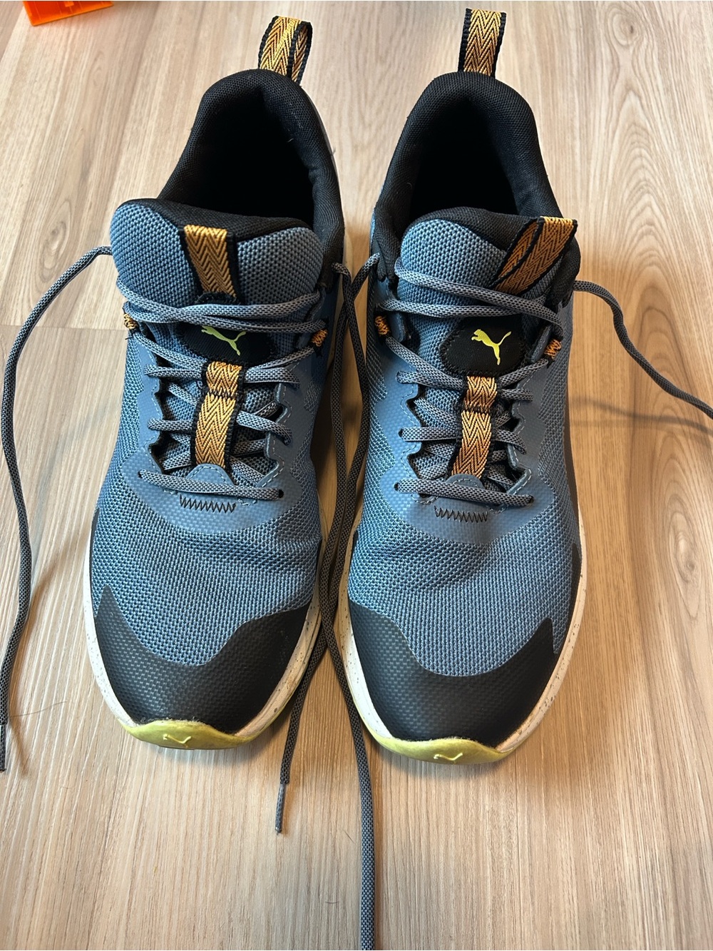 Puma Men’s Blue Athletic Shoes with Black and Yellow Accents